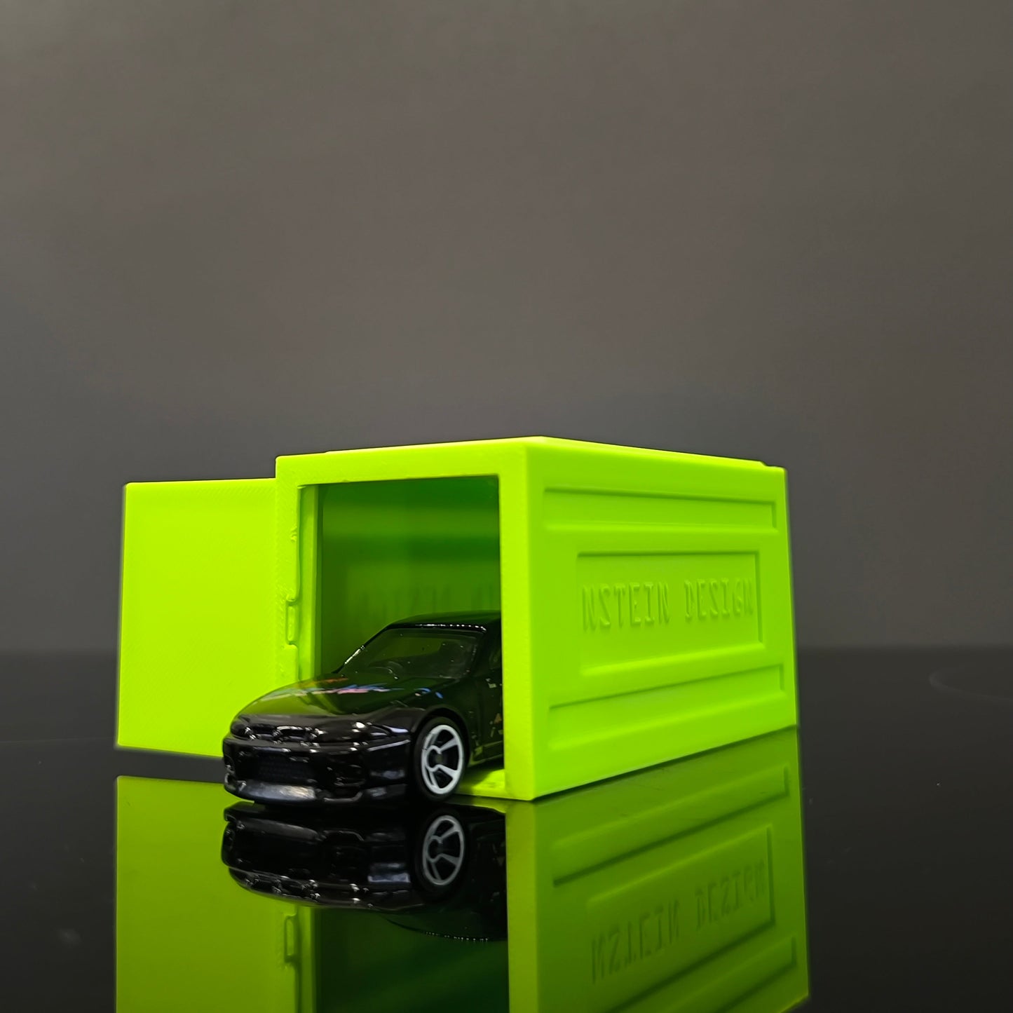 fluoreszkáló zöld színű hot wheels kisautó garázs