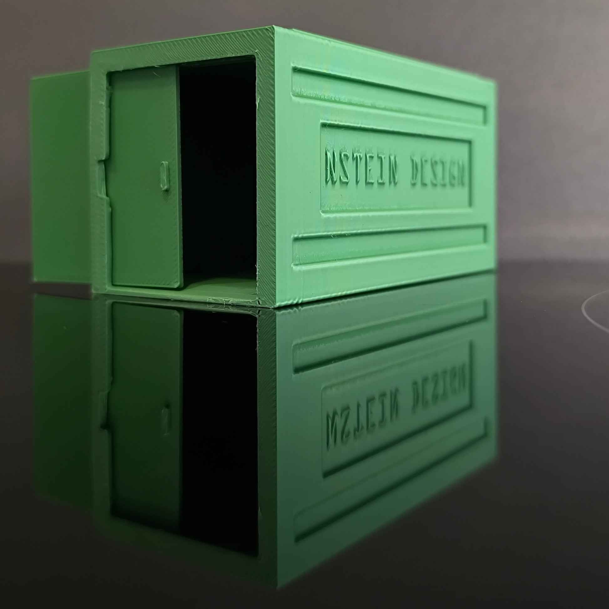 Zöld színű hot wheels kisautó garázs