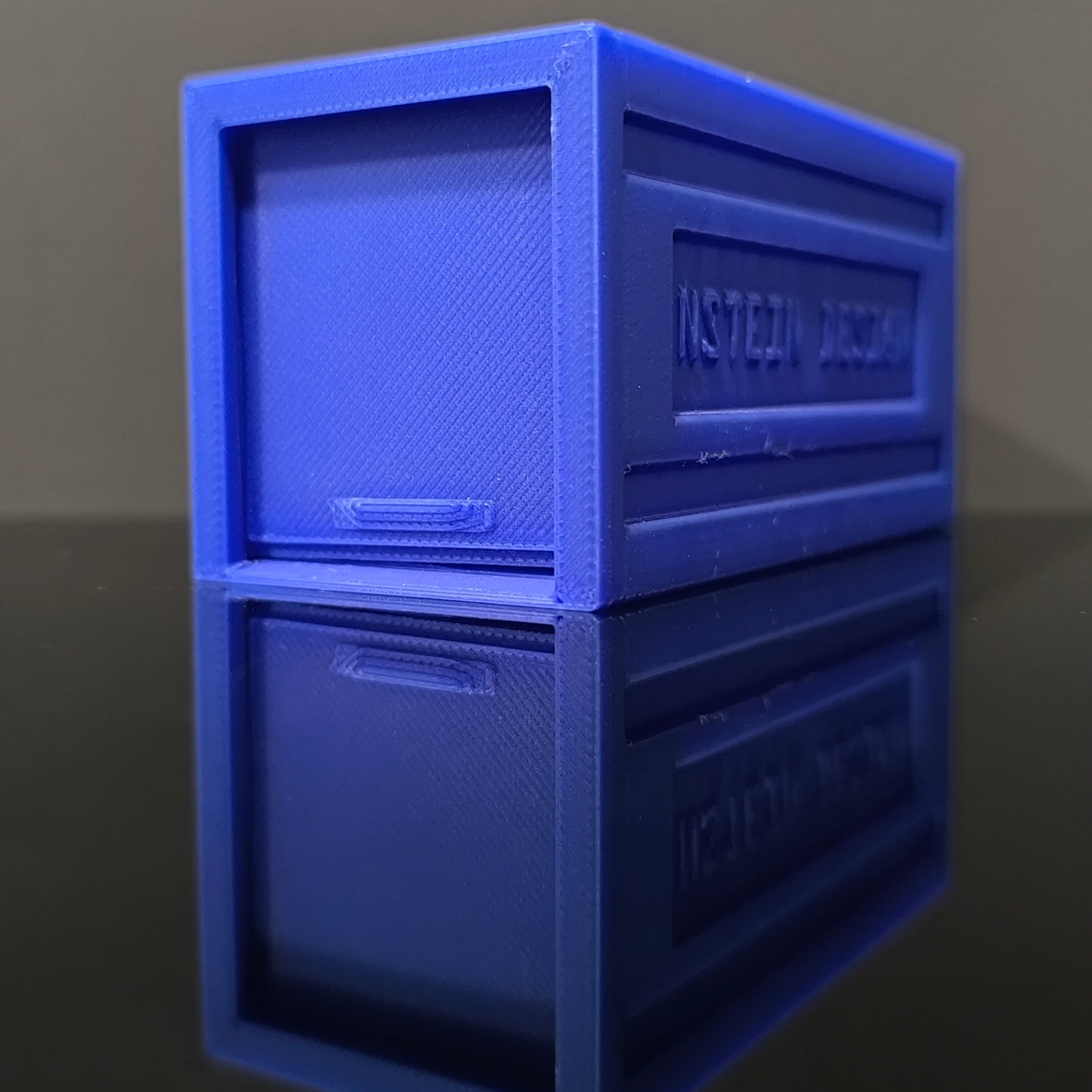 Indigókék színű hot wheels kisautó garázs