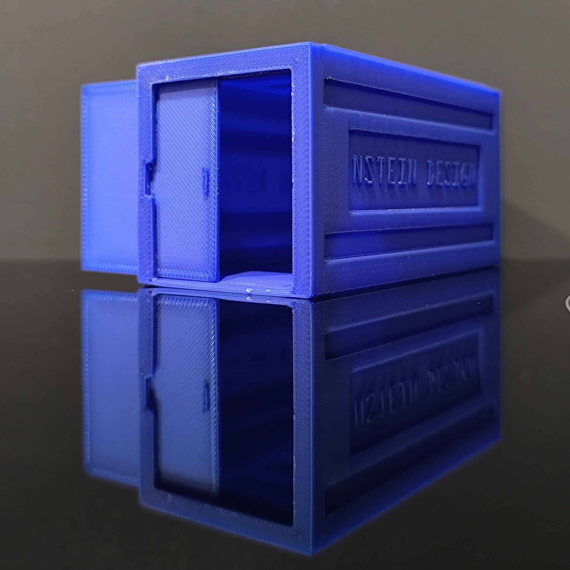 Indigókék színű hot wheels kisautó garázs