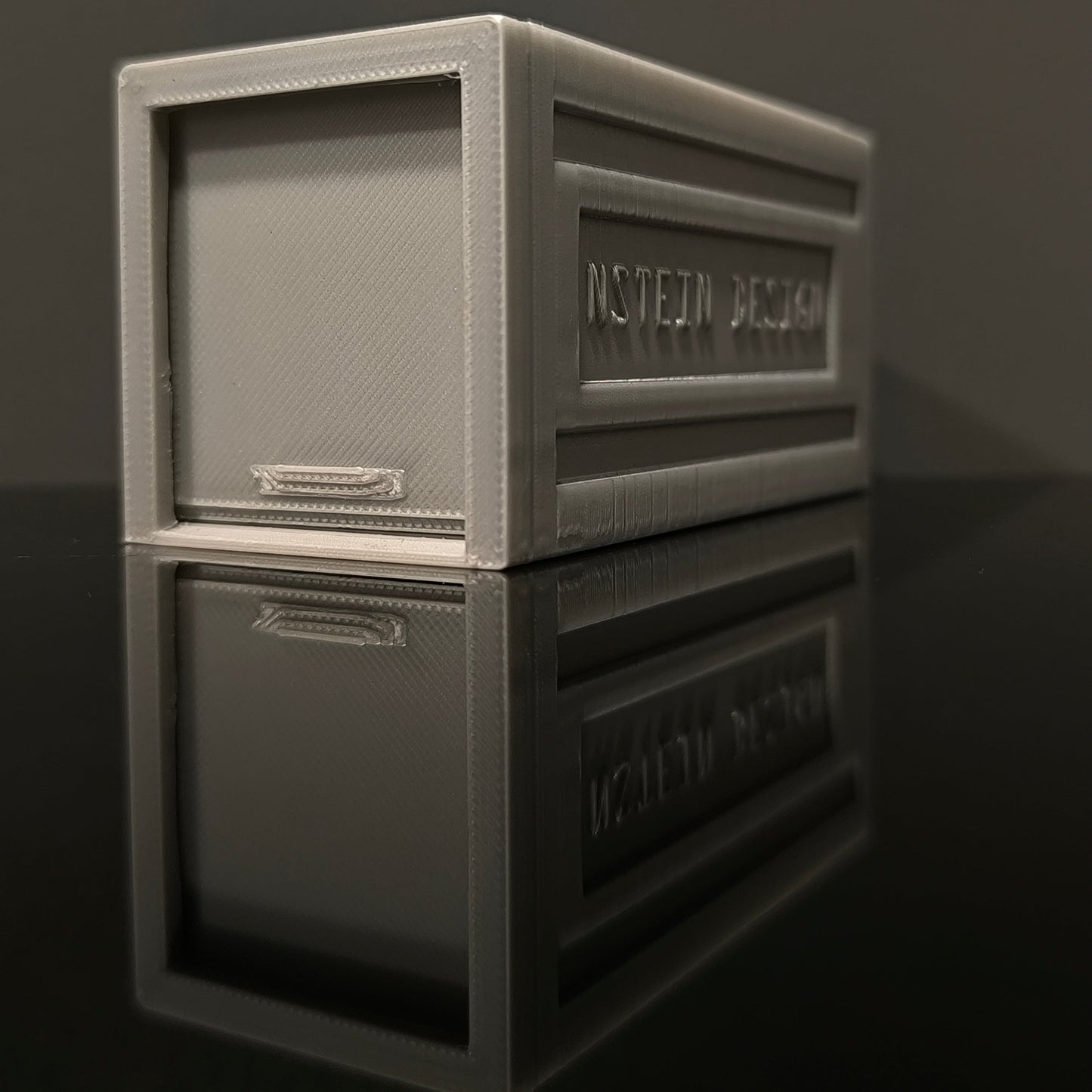 Alu szürke színű hot wheels kisautó garázs