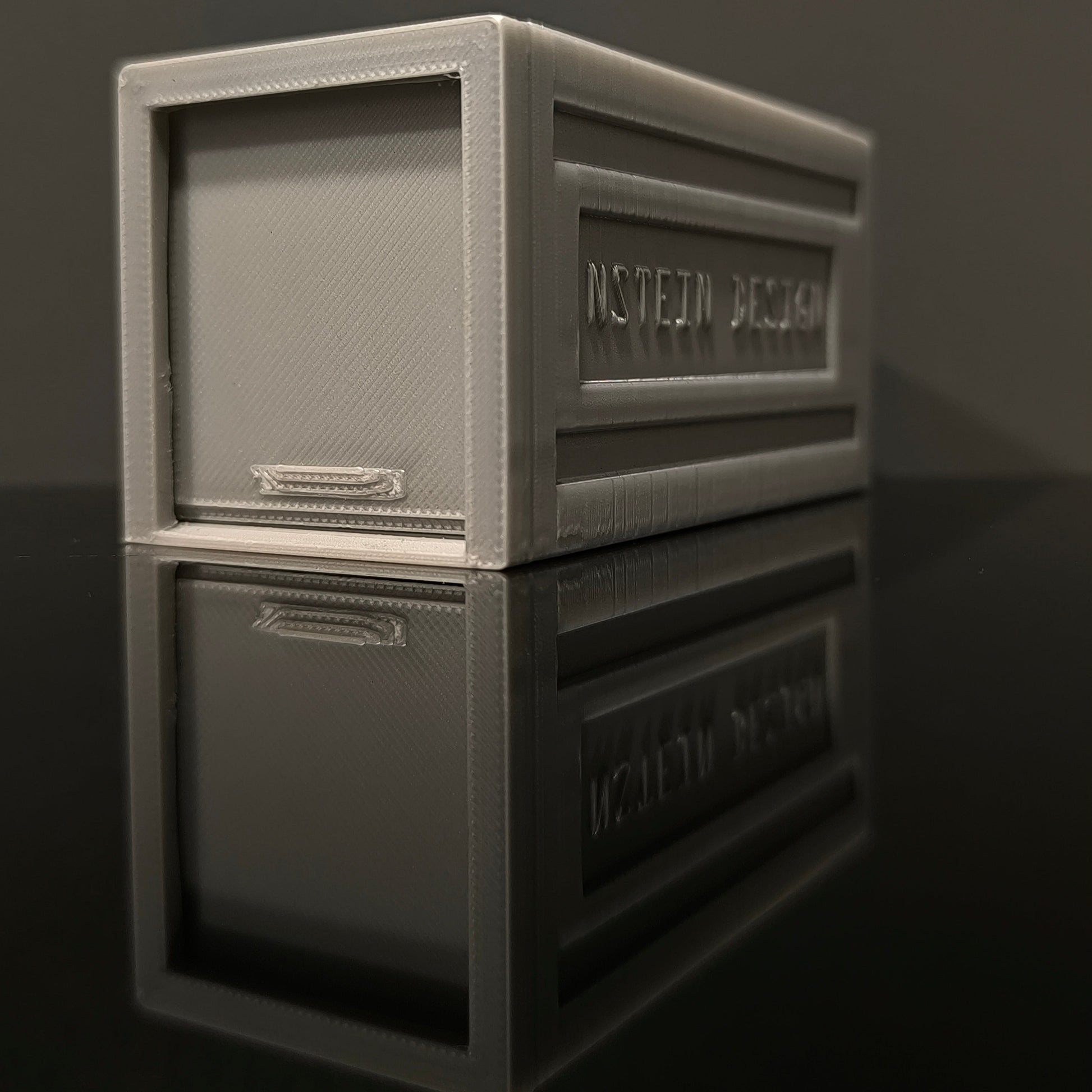 Alu szürke színű hot wheels kisautó garázs