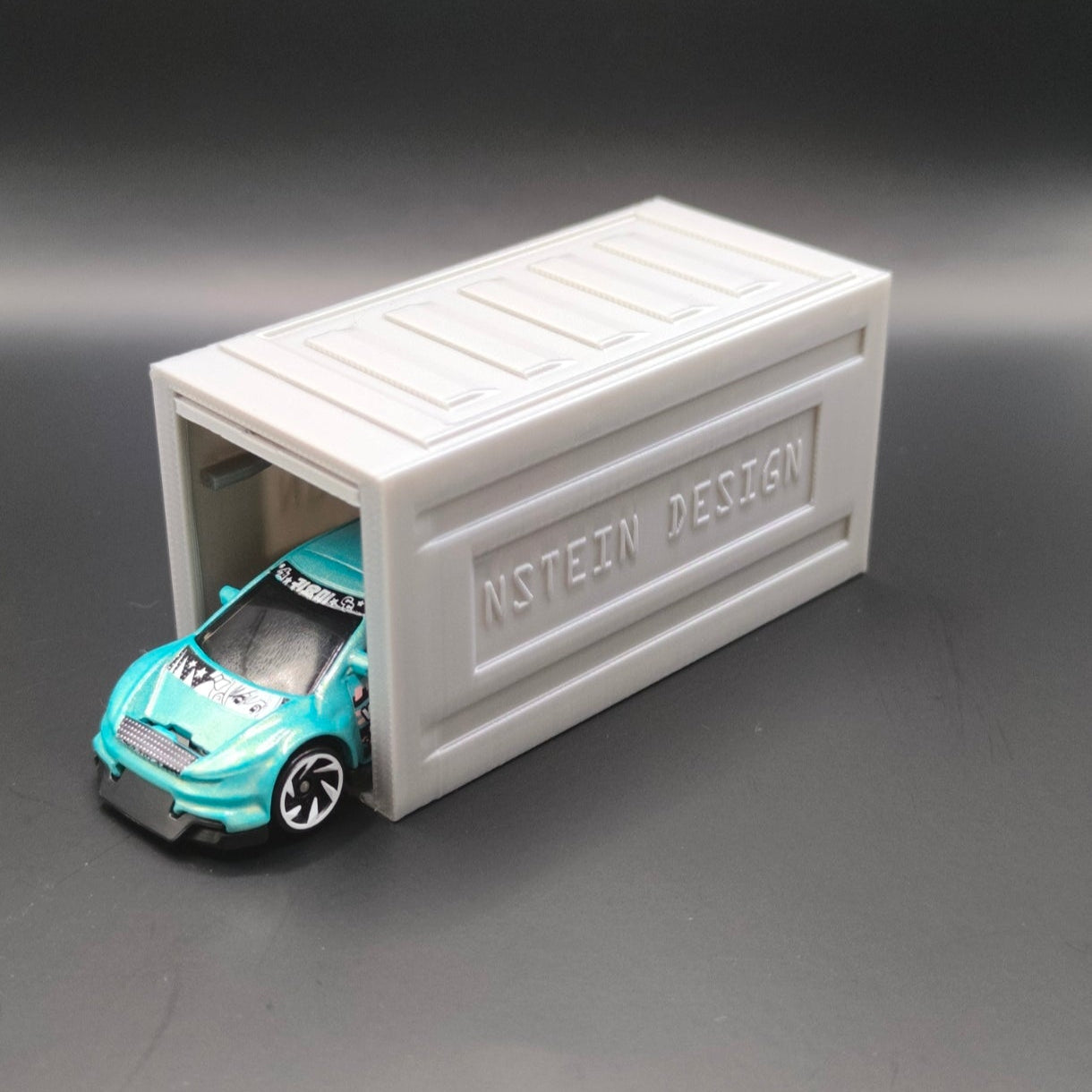 Kisautó garázs 2.0 - Hot Wheels, Majorette, Matchbox kompatibilis (Befelé nyíló)